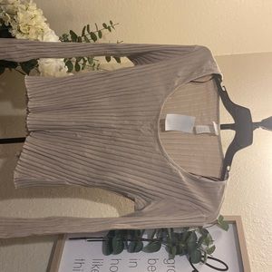 Simple and cute—it can 100% be paired with any bottoms in your closet right now!